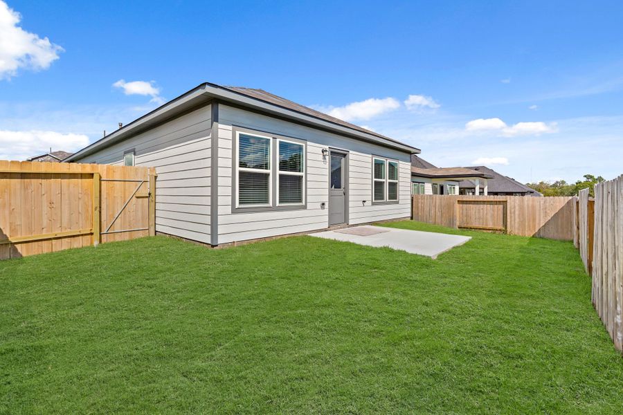 A house with a fence around it. A house with a fence around it.