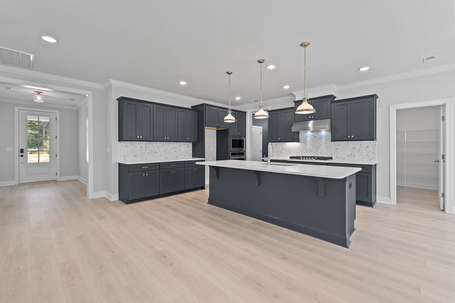 Representative furnished interior of a home built from the The Whitley by RobuckHomes in Kennebec Crossing, Angier (Image 16). Representative furnished interior of a home built from the The Whitley by RobuckHomes in Kennebec Crossing, Angier (Image 16).