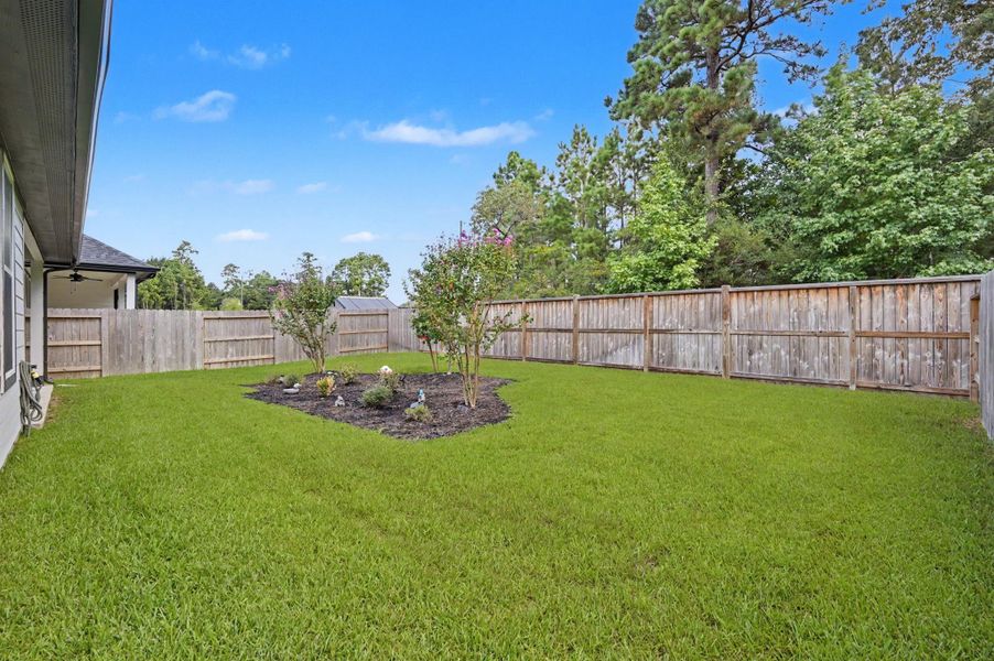 Exterior details and patio area of a home in , Conroe (Image 23). Exterior details and patio area of a home in , Conroe (Image 23).
