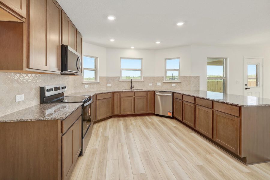 Furnished interior view inside a new home in Stoney Chase, Del Valle (Image 7).