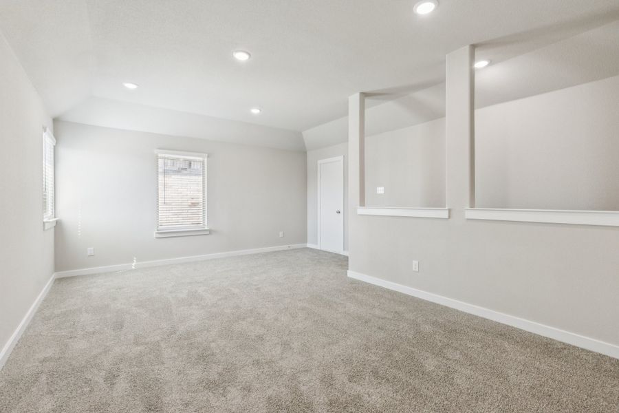 Game Room in the Stanley II home plan by Trophy Signature Homes – REPRESENTATIVE PHOTO