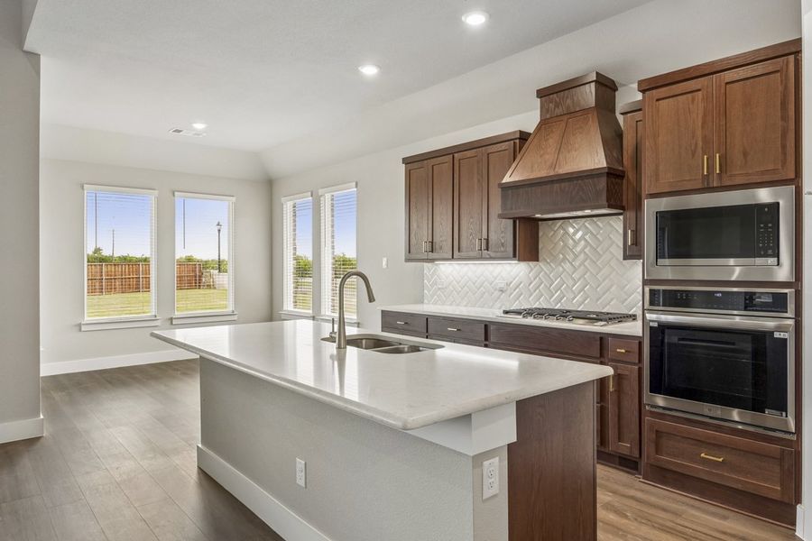 Representative furnished interior of a home built from the The Mockingbird by Lillian Custom Homes in Polo Ridge, Forney (Image 10).