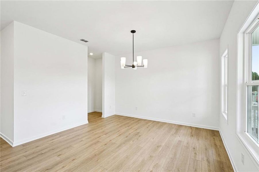 Spacious, unfurnished interior of a new home in Eastlyn Crossing, Flowery Branch (Image 15).