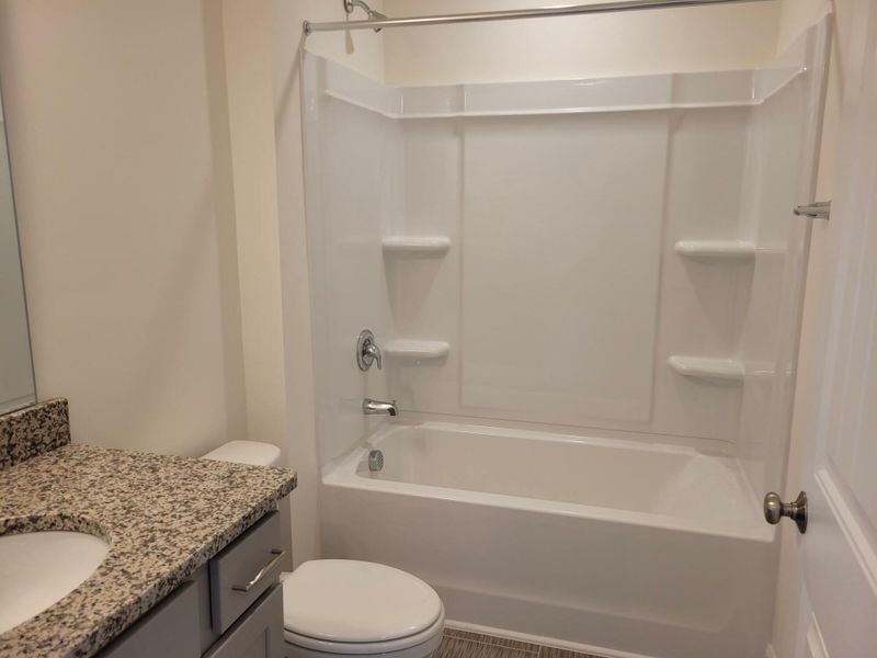 Furnished interior view inside a new home in 1158 Place Townhomes, Wilson (Image 7).