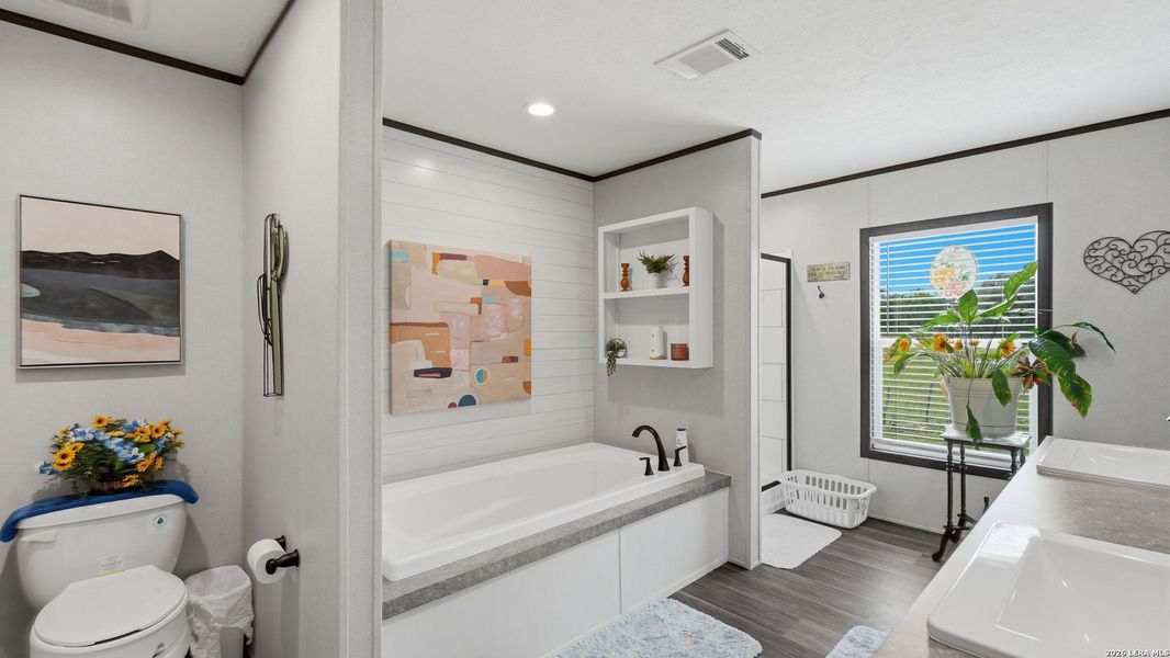 Furnished interior view inside a new home in , Seguin (Image 26).