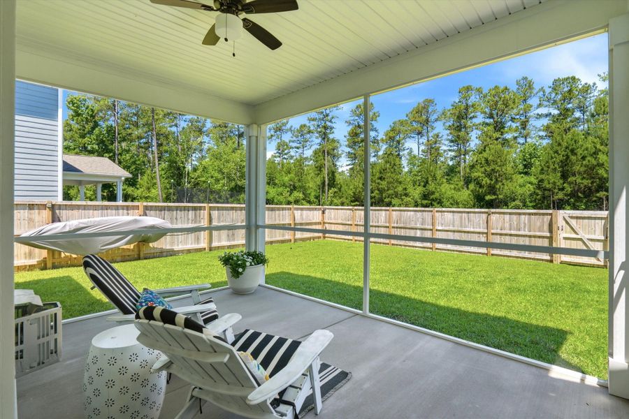 Exterior details and patio area of a home in Tidewater at Lakes of Cane Bay, Summerville (Image 27).