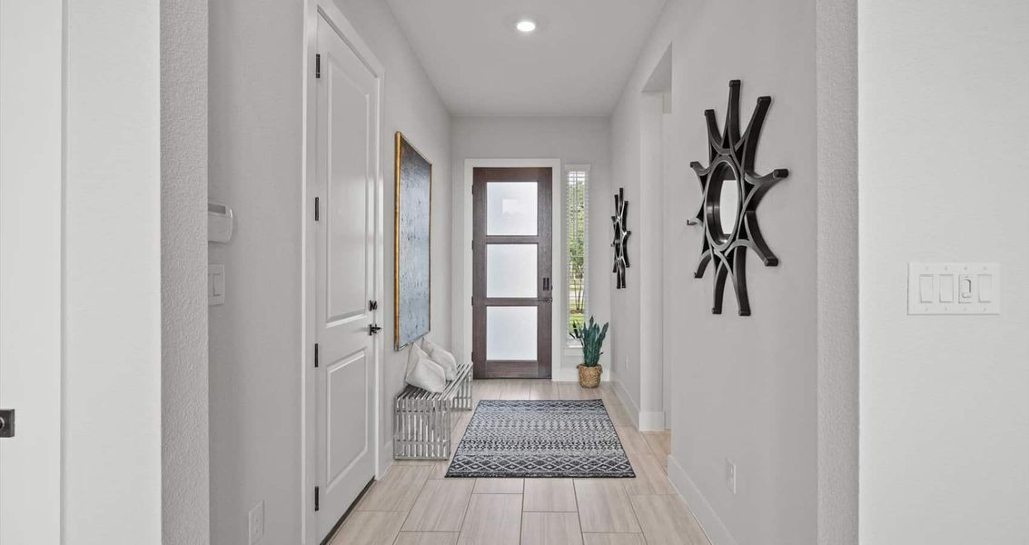 Furnished interior view inside a new home in 6 Creeks, Kyle (Image 6).