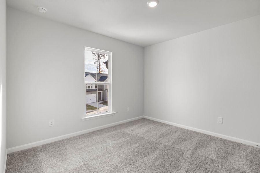 Spacious, unfurnished interior of a new home in Poets Walk, Whitsett (Image 21).