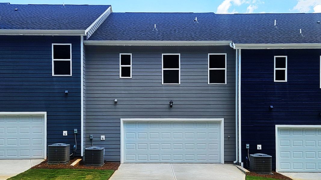 Exterior details and patio area of a home in Brookland Commons, Monroe (Image 3).