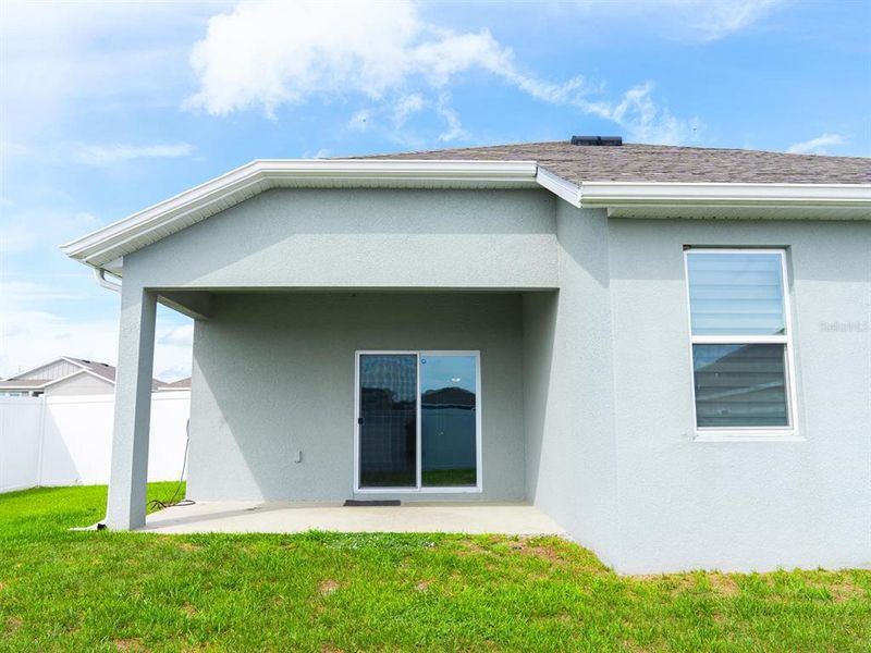 Exterior details and patio area of a home in Cypress Park Estates, Haines City (Image 20).