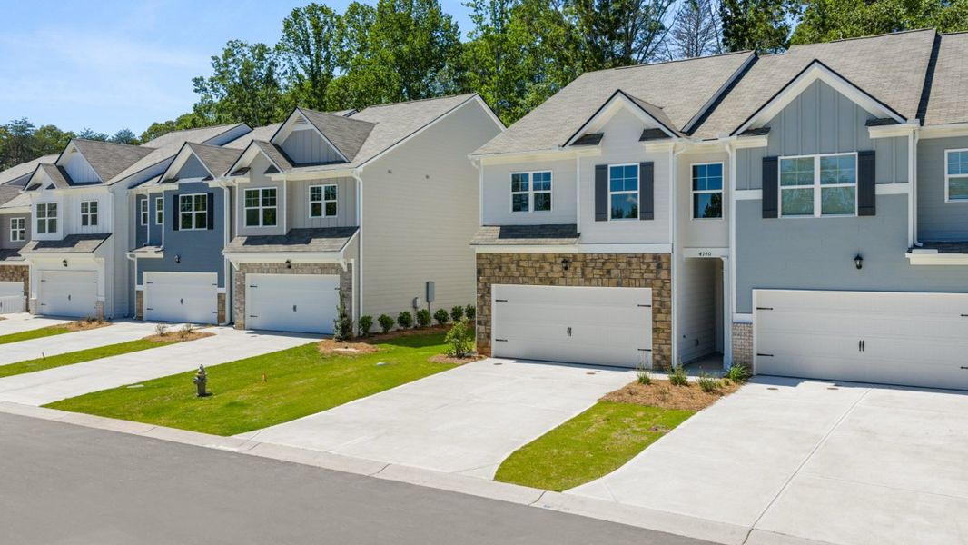 Representative exterior photo of a completed home built from the SUDBURY 24' TOWNHOME by D.R. Horton in Falcon Landing Townhomes, Gainesville, GA (Image 2).