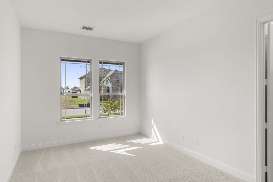 Representative unfurnished interior of a home built from the Del Rio by Windsor Homes in Anna Town Square, Anna (Image 28).