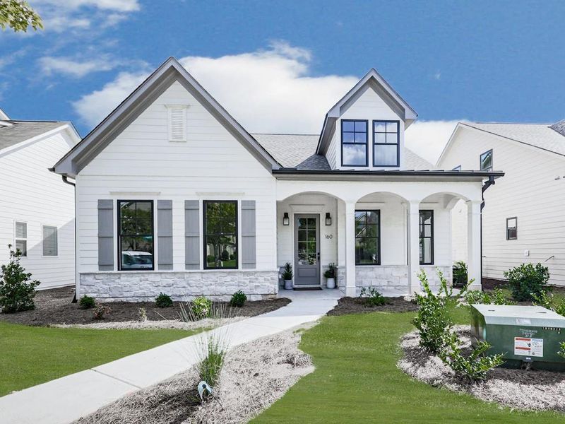 Front exterior of a new home in , Holly Springs, GA, highlighting curb appeal (Image 1). Front exterior of a new home in , Holly Springs, GA, highlighting curb appeal (Image 1).