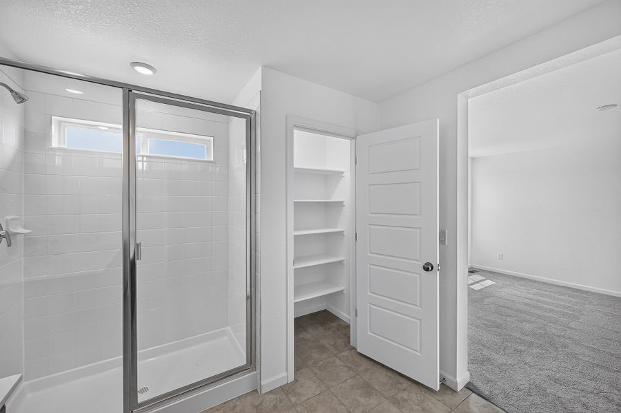 Furnished interior view inside a new home in The Aurora Highlands, Aurora (Image 9).