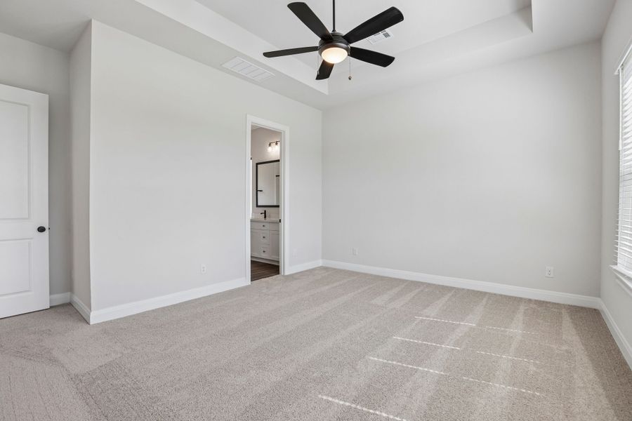 Spacious, unfurnished interior of a new home in 6 Creeks, Kyle (Image 18).