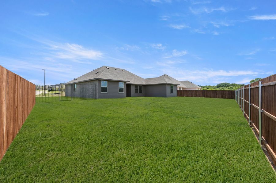 Front exterior of a new home in Mountain Valley Lake, Burleson, TX, highlighting curb appeal (Image 21). Front exterior of a new home in Mountain Valley Lake, Burleson, TX, highlighting curb appeal (Image 21).