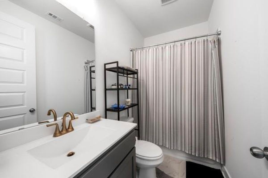 Furnished interior view inside a new home in , Katy (Image 9).