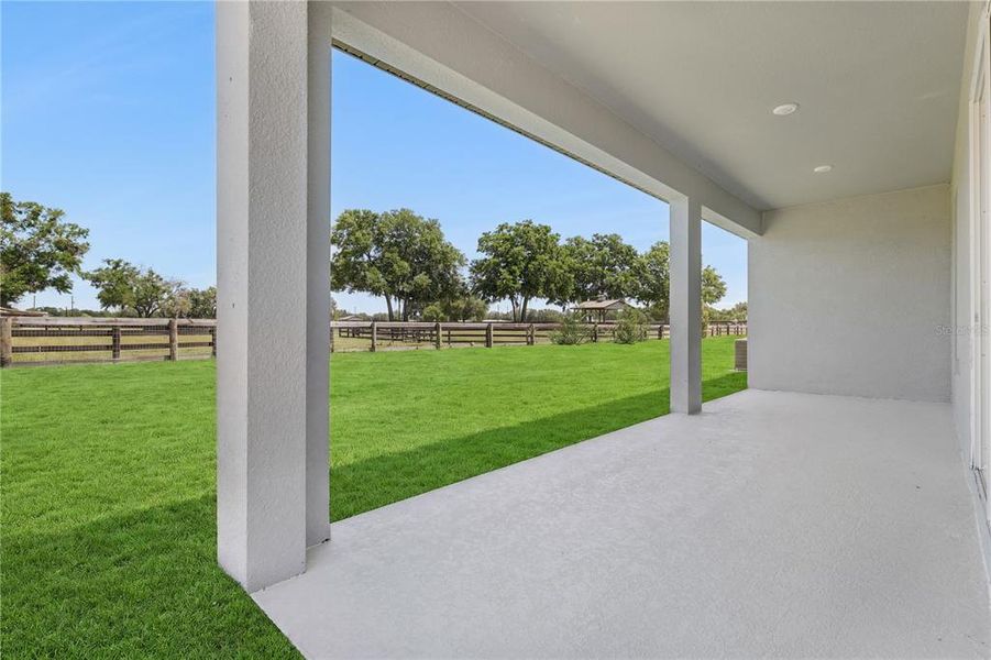Exterior details and patio area of a home in Sabana Reserve, Ocala (Image 2). Exterior details and patio area of a home in Sabana Reserve, Ocala (Image 2).