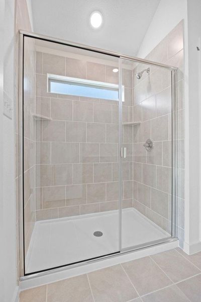 Primary Bath in the Quartz home plan by Trophy Signature Homes – REPRESENTATIVE PHOTO Primary Bath in the Quartz home plan by Trophy Signature Homes – REPRESENTATIVE PHOTO