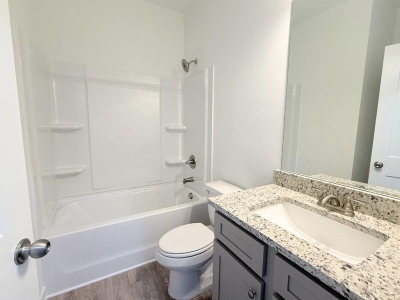 Furnished interior view inside a new home in Sutton's Landing, Statham (Image 5).