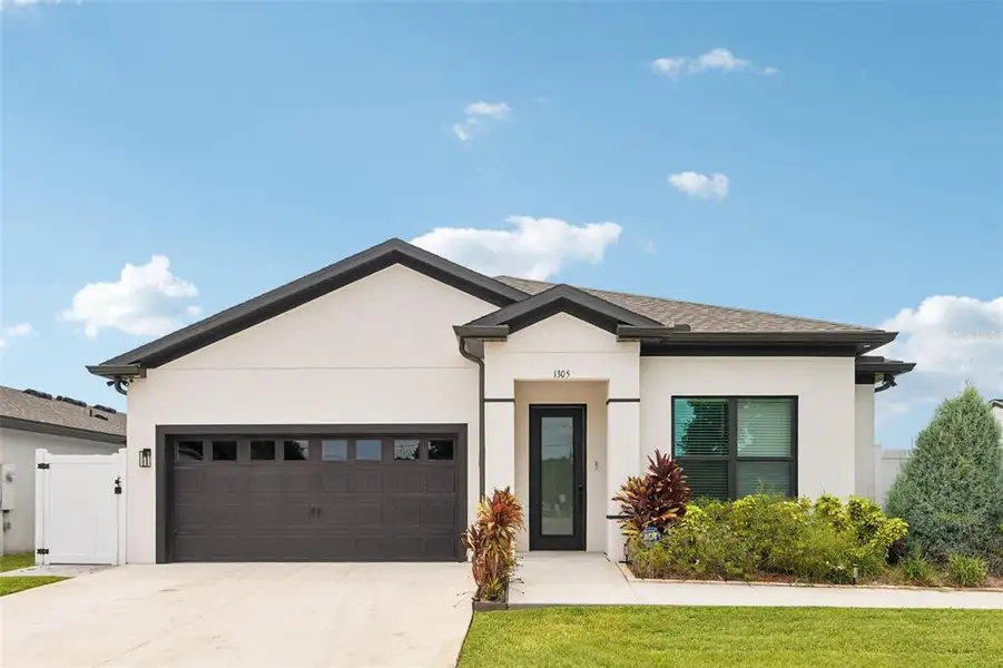 Front exterior of a new home in , Tampa, FL, highlighting curb appeal (Image 2). Front exterior of a new home in , Tampa, FL, highlighting curb appeal (Image 2).