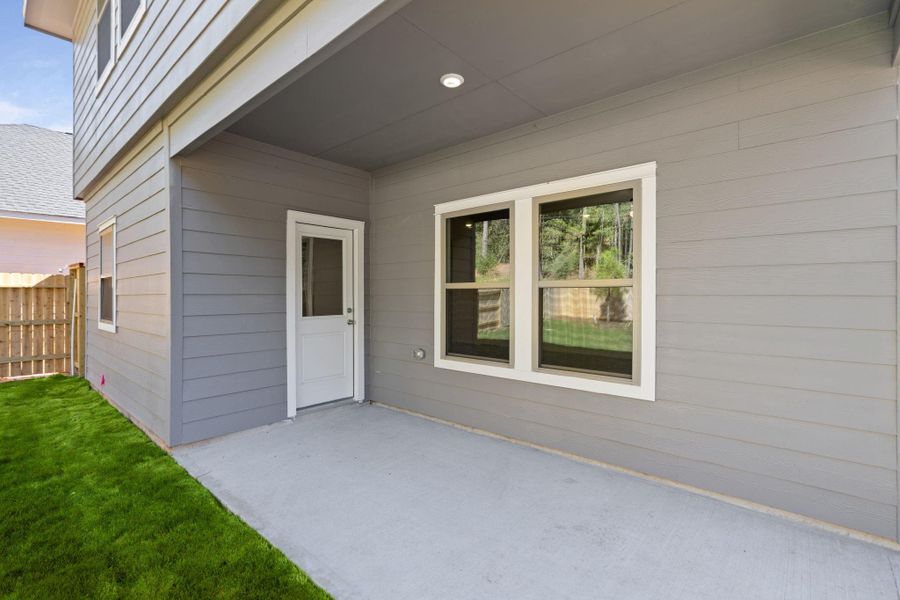 Exterior details and patio area of a home in Westridge Cove, Conroe (Image 3). Exterior details and patio area of a home in Westridge Cove, Conroe (Image 3).