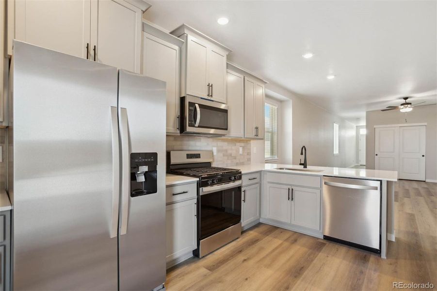 Furnished interior view inside a new home in Second Creek Farm, Commerce City (Image 4).