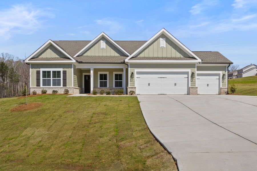 Front exterior of a new home in Cherokee Knoll, Williamston, SC, highlighting curb appeal (Image 1). Front exterior of a new home in Cherokee Knoll, Williamston, SC, highlighting curb appeal (Image 1).