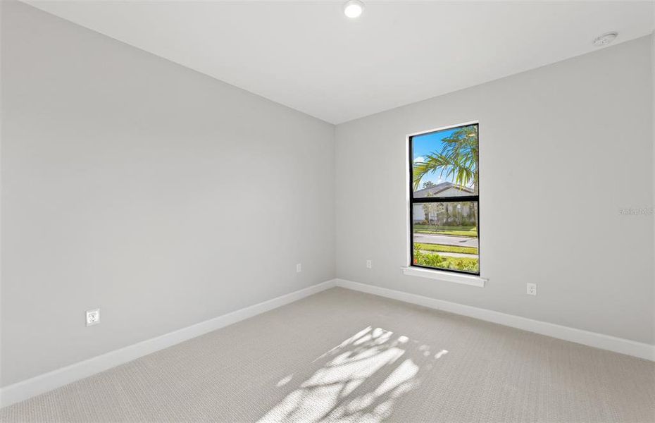 Spacious, unfurnished interior of a new home in Arbor Oaks, North Port (Image 27). Spacious, unfurnished interior of a new home in Arbor Oaks, North Port (Image 27).