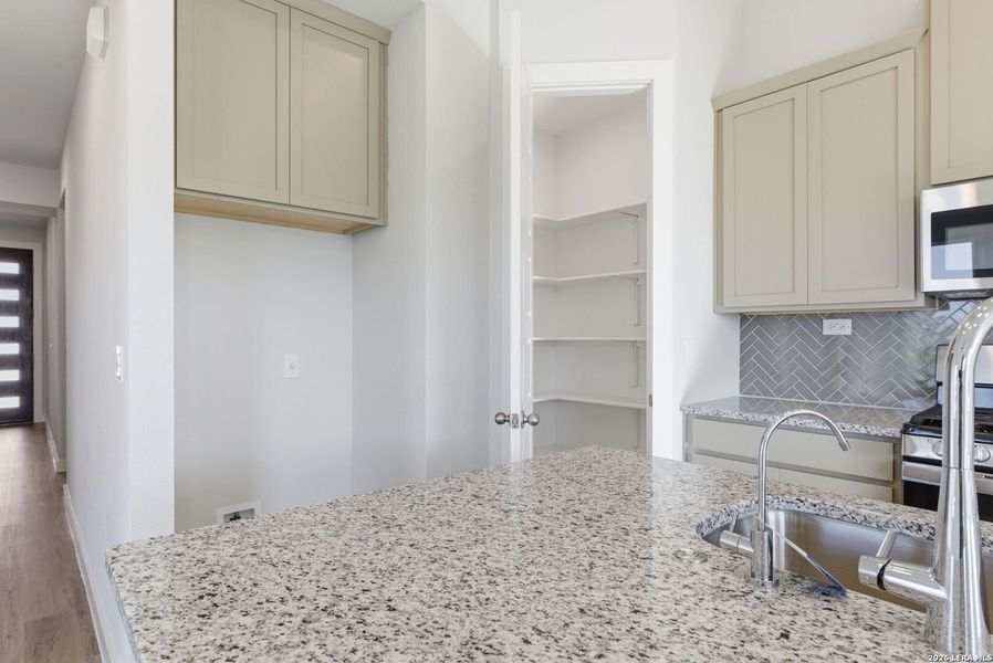 Furnished interior view inside a new home in The Meadows at Hunters Ranch, San Antonio (Image 11).