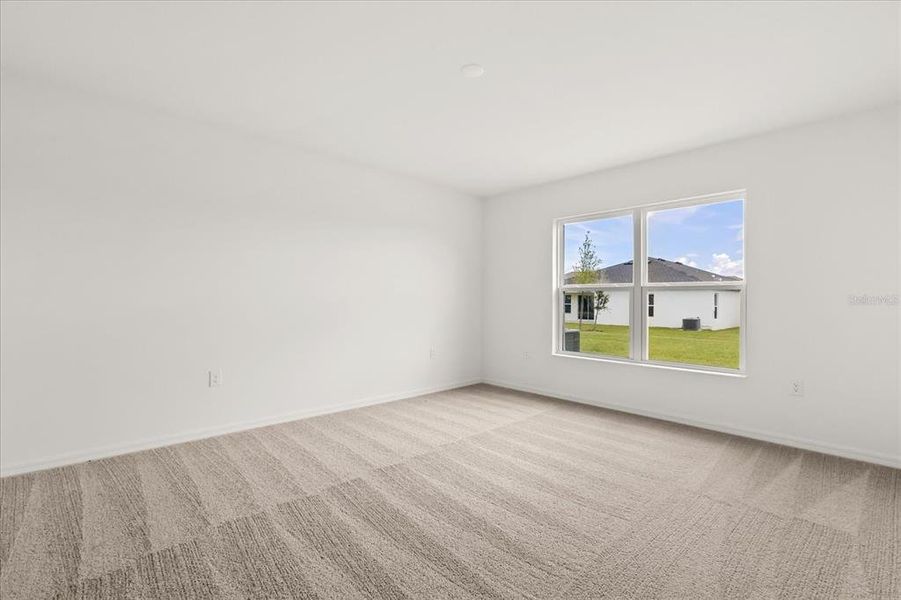 Spacious, unfurnished interior of a new home in Reserve at Forest Lake II, Lake Wales (Image 9).