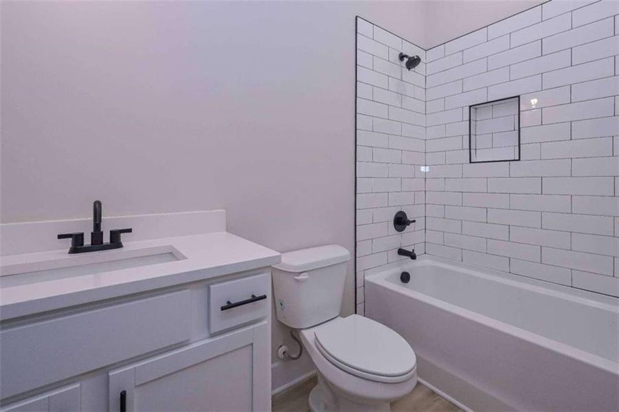 Furnished interior view inside a new home in , Buchanan (Image 6).