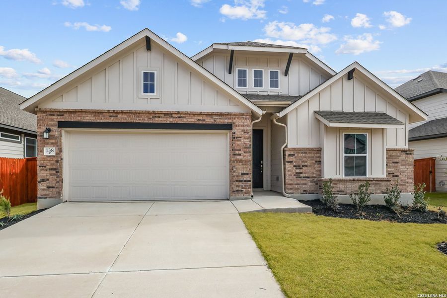 Front exterior of a new home in Megan's Landing, Castroville, TX, highlighting curb appeal (Image 1). Front exterior of a new home in Megan's Landing, Castroville, TX, highlighting curb appeal (Image 1).