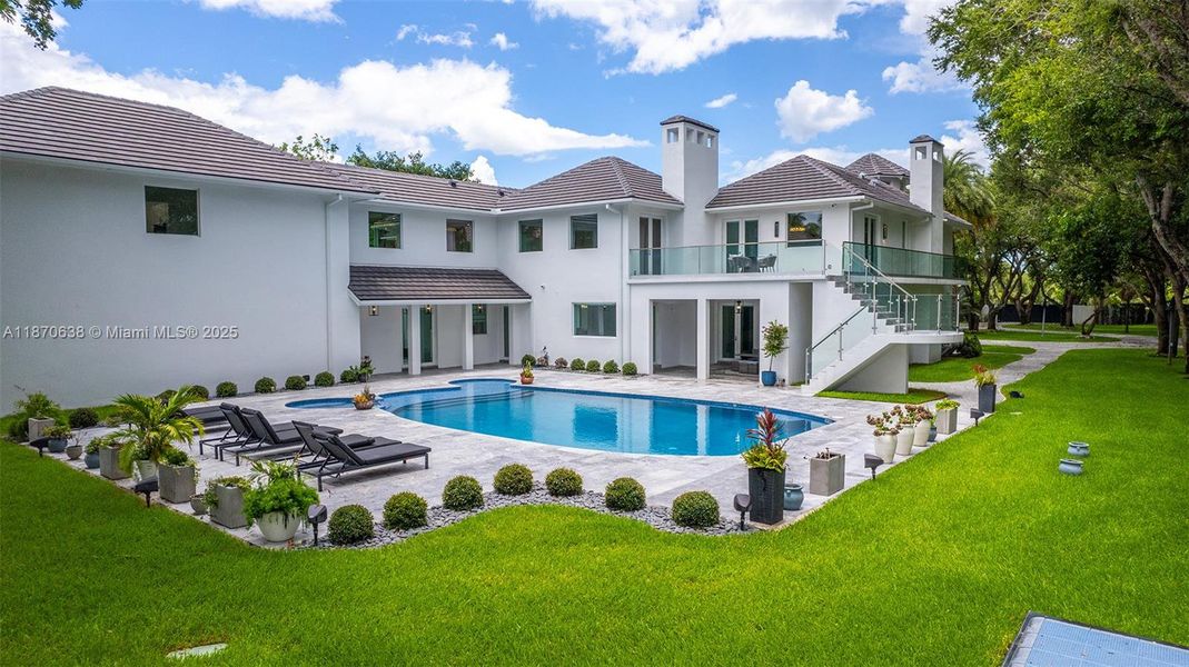 Front exterior of a new home in , Palmetto Bay, FL, highlighting curb appeal (Image 1).