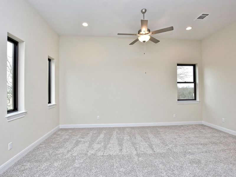 Representative unfurnished interior of a home built from the Avalon by Giddens Homes in Scofield Farms Estates, Georgetown (Image 158).