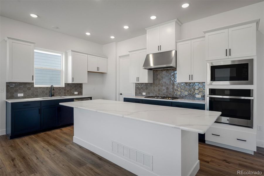 Furnished interior view inside a new home in Revel Crossing at Wolf Ranch - The Panorama Collection, Colorado Springs (Image 31).