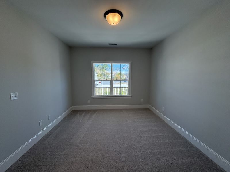Spacious, unfurnished interior of a new home in Riverside Cove, Wilmington (Image 22).