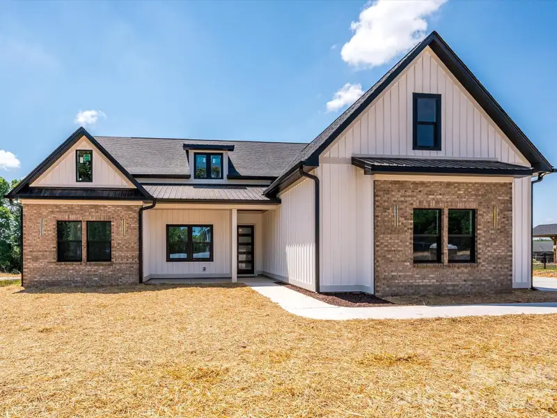 Front exterior of a new home in , Bessemer City, NC, highlighting curb appeal (Image 2). Front exterior of a new home in , Bessemer City, NC, highlighting curb appeal (Image 2).
