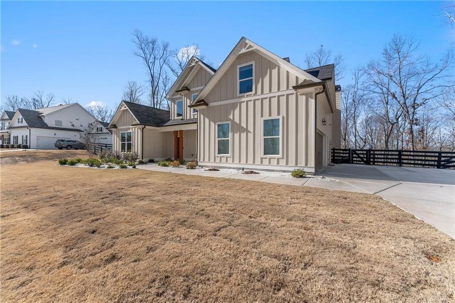 Front exterior of a new home in , Dahlonega, GA, highlighting curb appeal (Image 2). Front exterior of a new home in , Dahlonega, GA, highlighting curb appeal (Image 2).