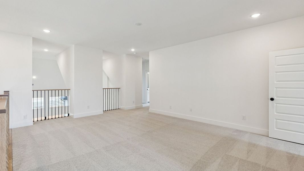 Representative unfurnished interior of a home built from the Reese II by Southgate Homes in The Reserve at Watters, Allen (Image 23).