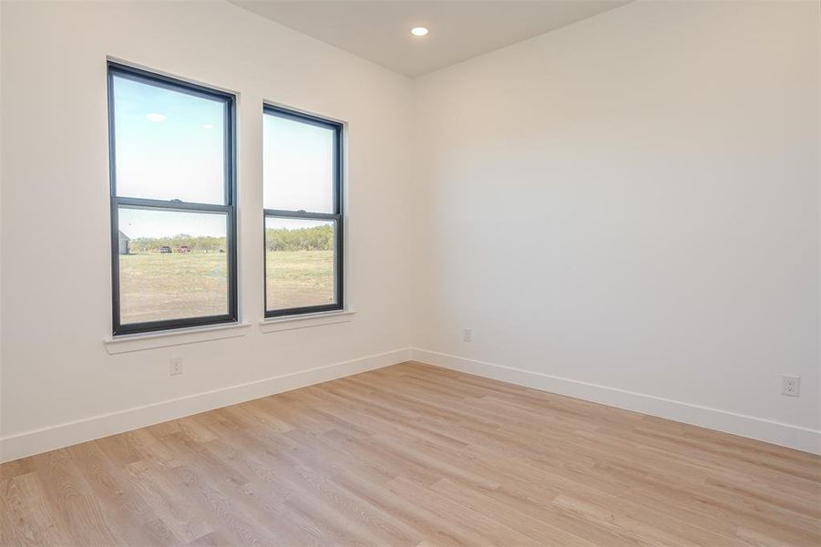 Empty room with light wood-type flooring