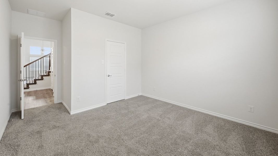 Spacious, unfurnished interior of a new home in Fireside by the Lake, Garland (Image 20).