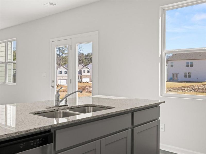 Furnished interior view inside a new home in Oaks at Cedar Grove, Fairburn (Image 9).