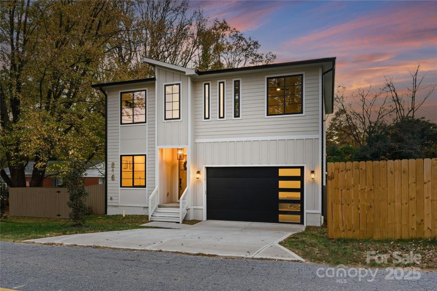 Front exterior of a new home in , Charlotte, NC, highlighting curb appeal (Image 24).