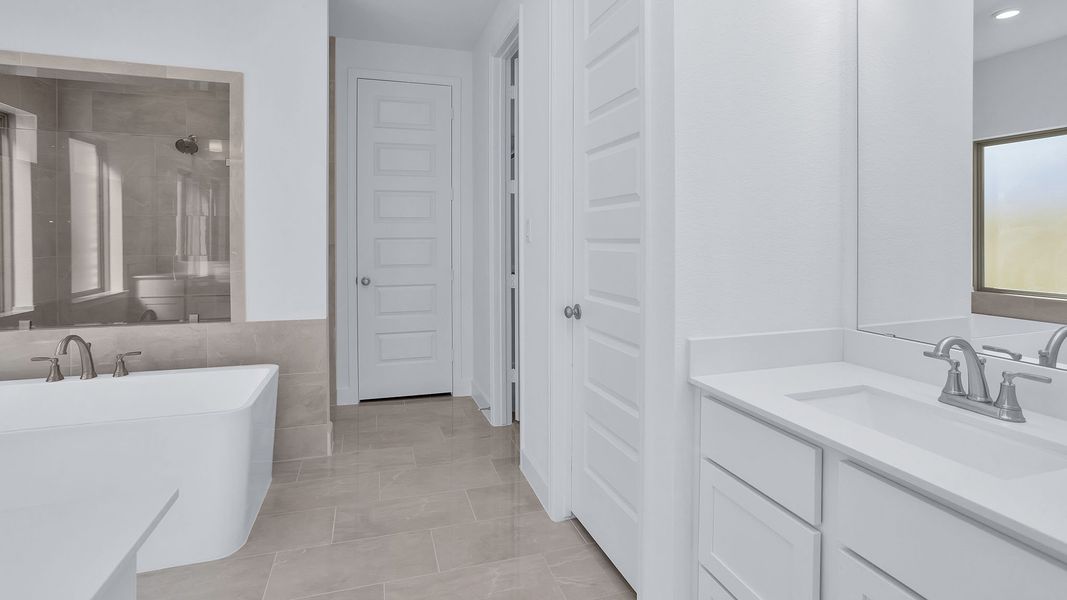 Furnished interior view inside a new home in Grand Central Park, Conroe (Image 9).