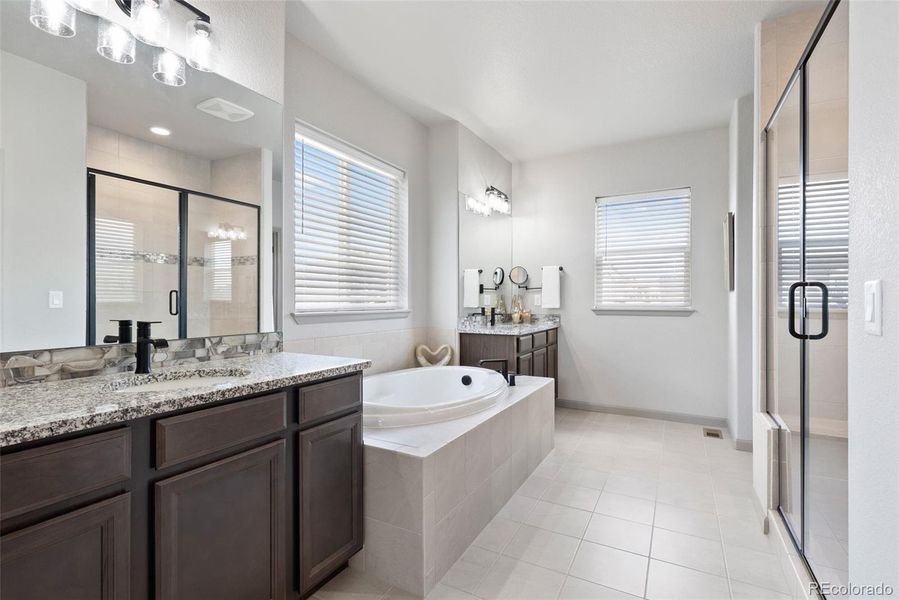 Luxurious. Spacious. Primary oasis for you.