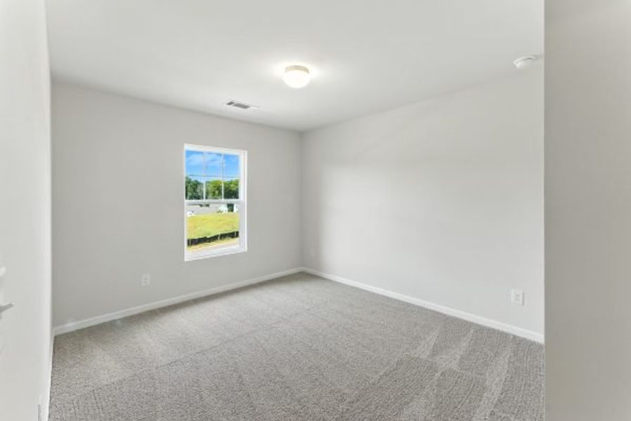 Representative unfurnished interior of a home built from the Brentwood by Piedmont Residential in Falls Creek, Flowery Branch (Image 30).