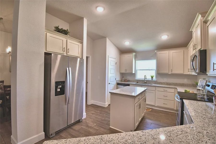 Furnished interior view inside a new home in Magnolia Park, Haines City (Image 15).