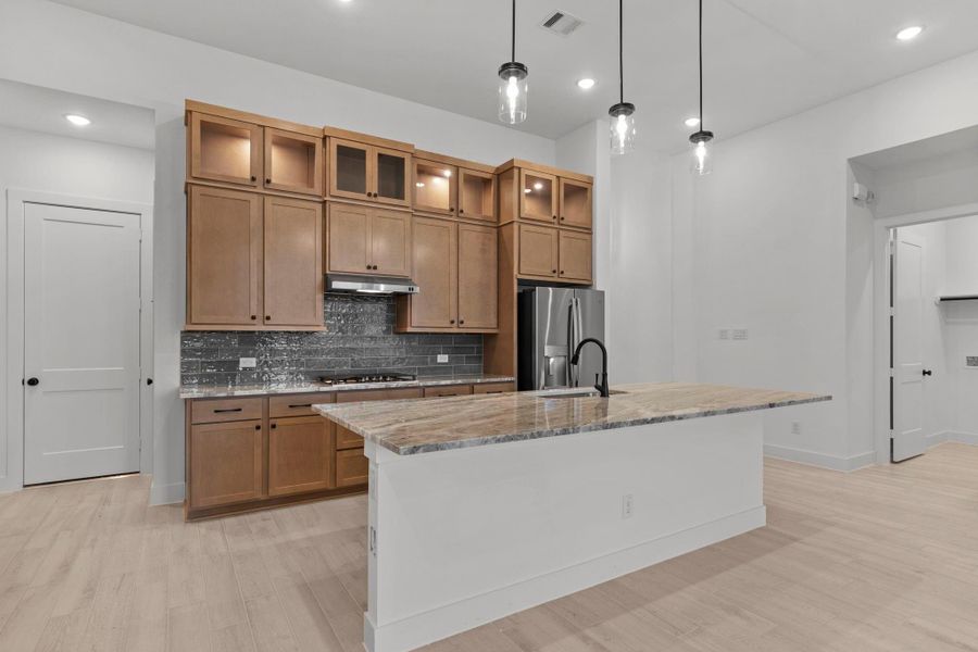 Furnished interior view inside a new home in Blue Heron, Mont Belvieu (Image 11).