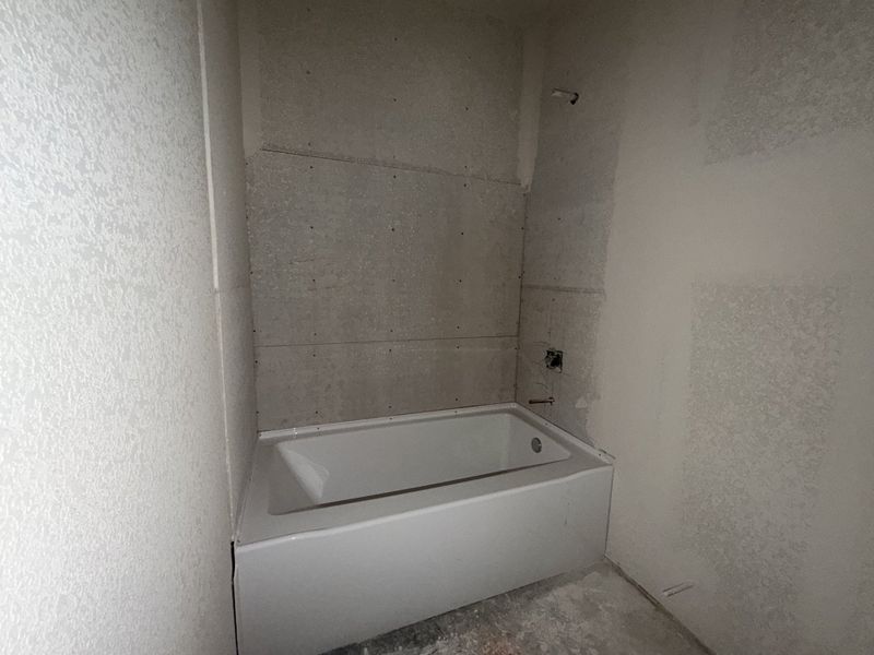 In-progress construction of a new home in Saddle Crest Estates, Weatherford, TX (Image 30).